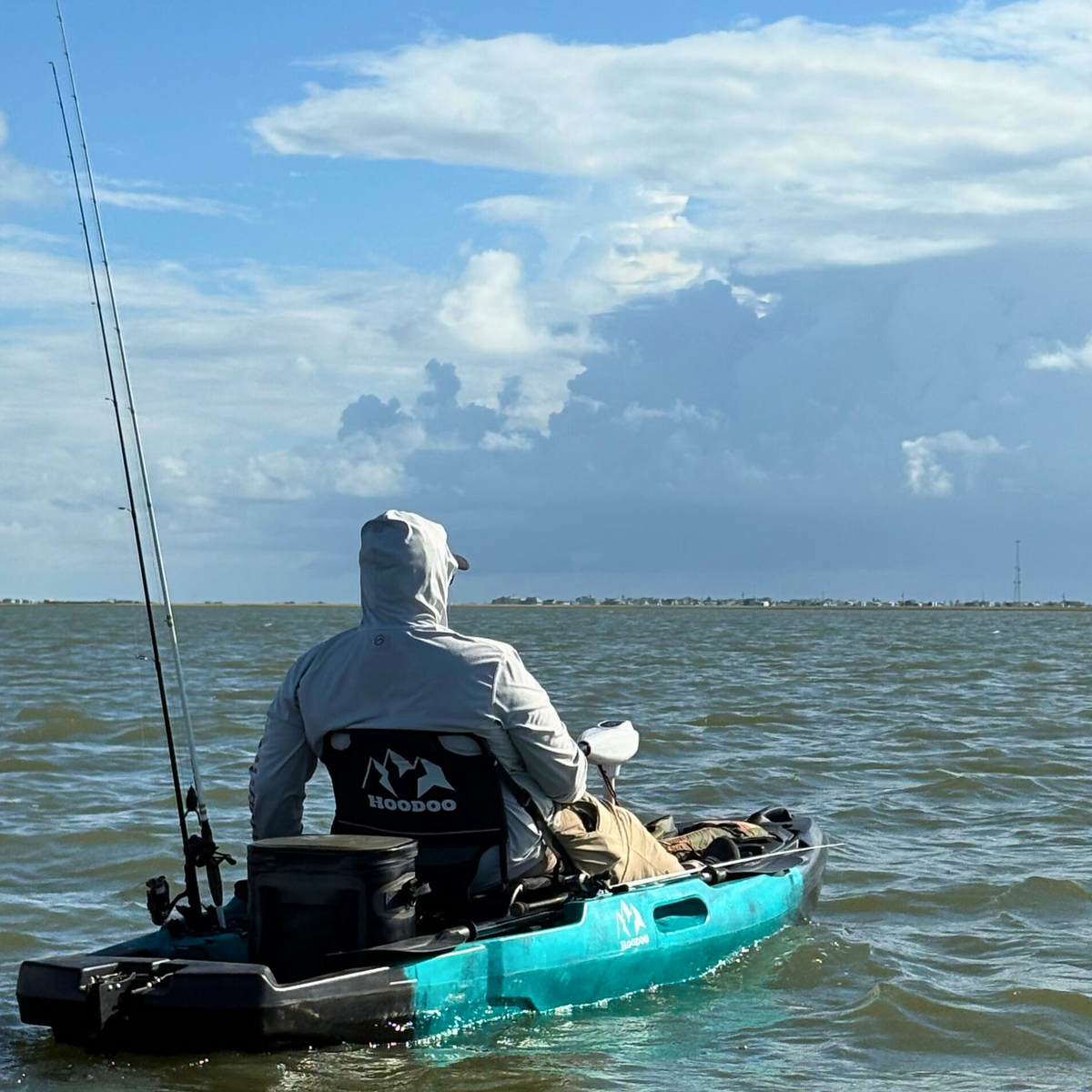 Hoodoo Blackfin 120P Pedal Drive Propeller Drive Fishing Kayak with trolling motor on the bay fishing. With Cooler