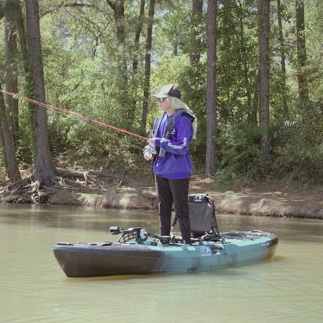 Hoodoo Voyager 100P Pedal Fishinkg Kayak - Angler Standing On The Water.